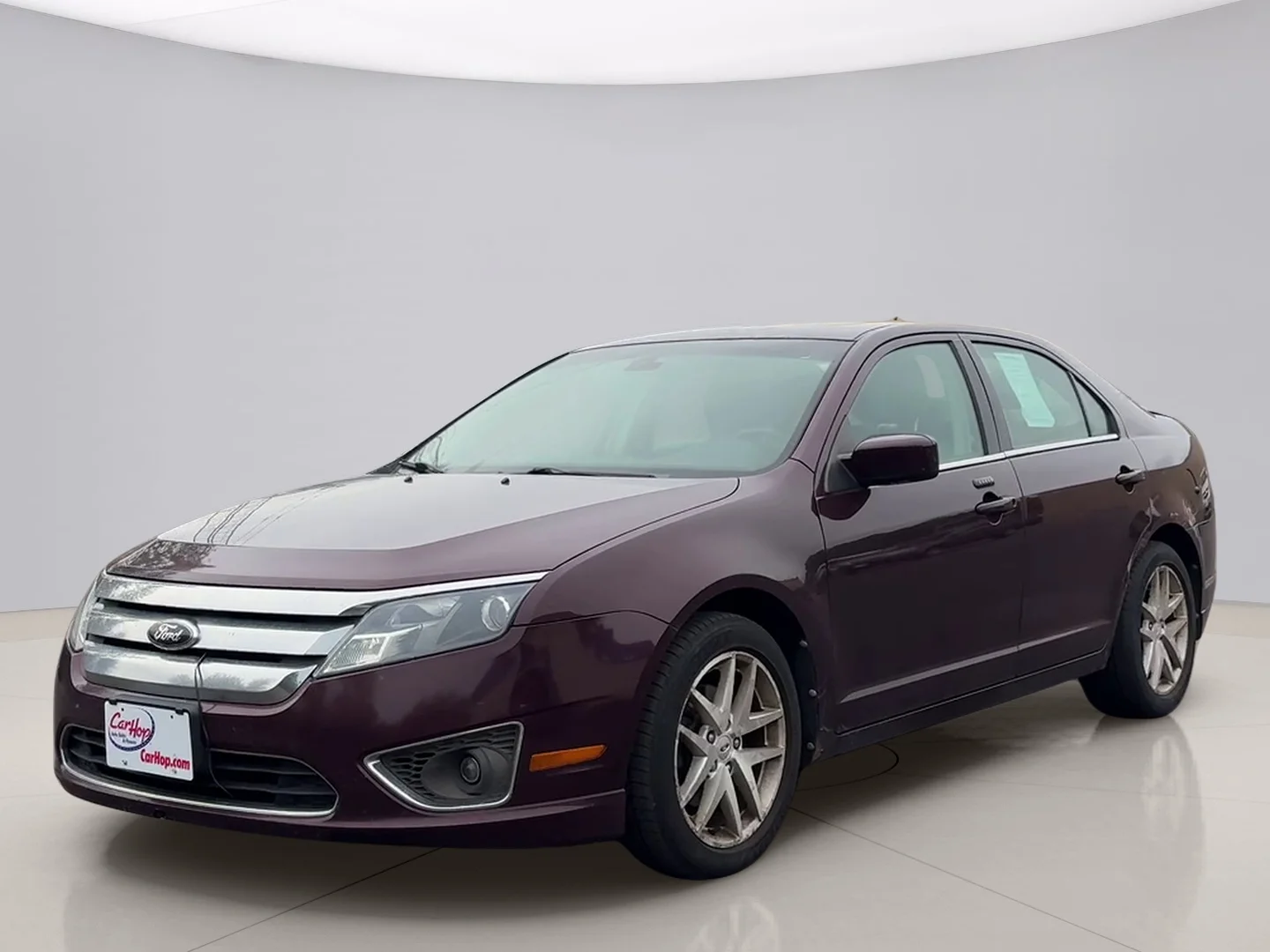 Used 2012 Maroon Ford SEL image 1