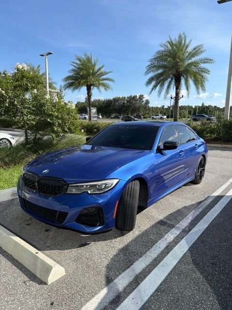 Used 2021 Blue Metallic BMW M340i image 1
