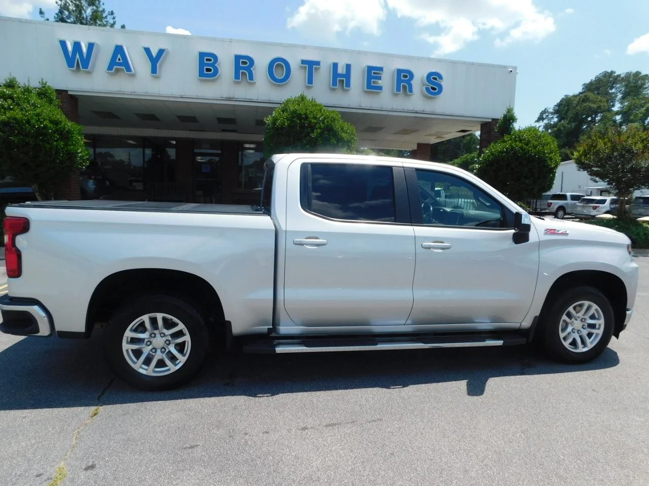 Used 2020 Silver Chevrolet 4WD CREW CAB 147 in LT image 1