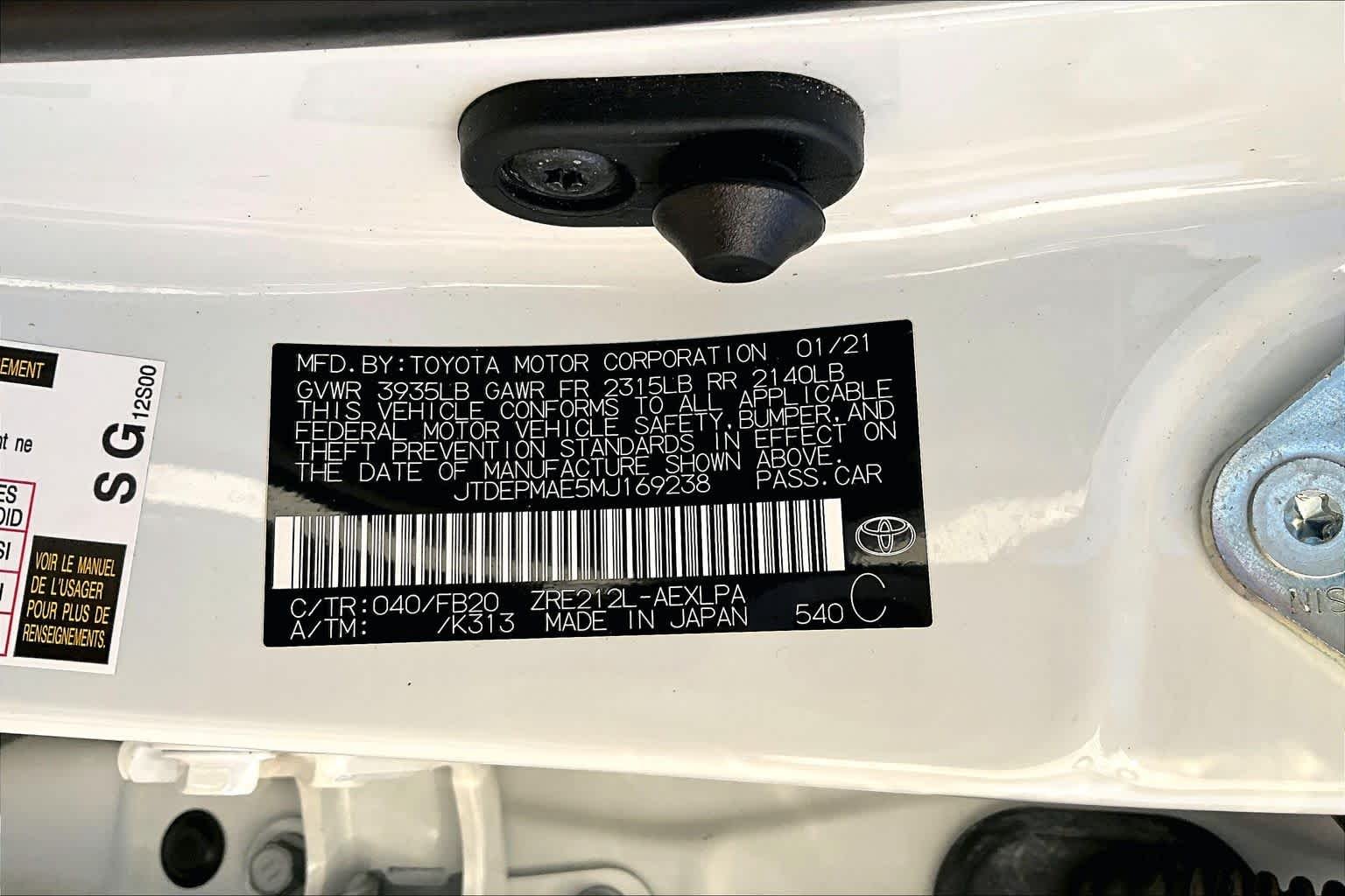 Used 2021 Super White Toyota LE image 36