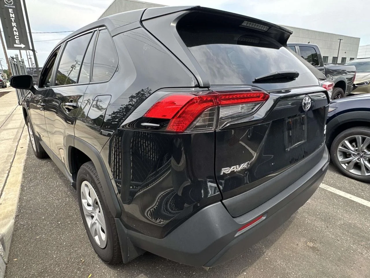 Used 2025 Midnight Black Metallic Toyota LE image 4