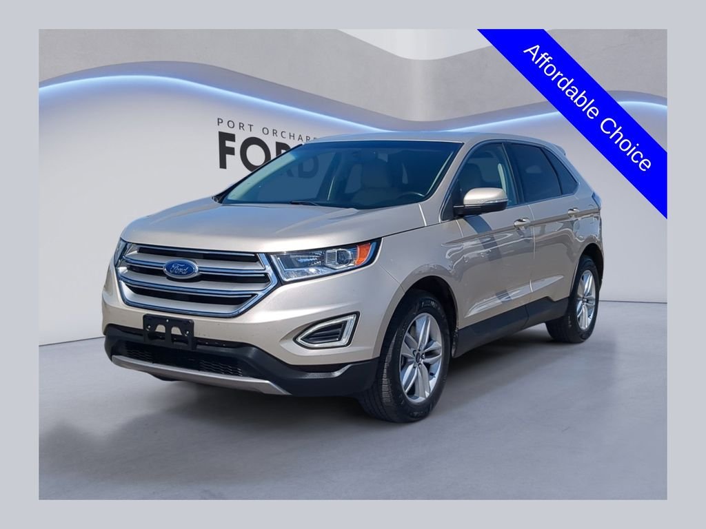 Used 2017 White Gold Metallic Ford SEL image 1