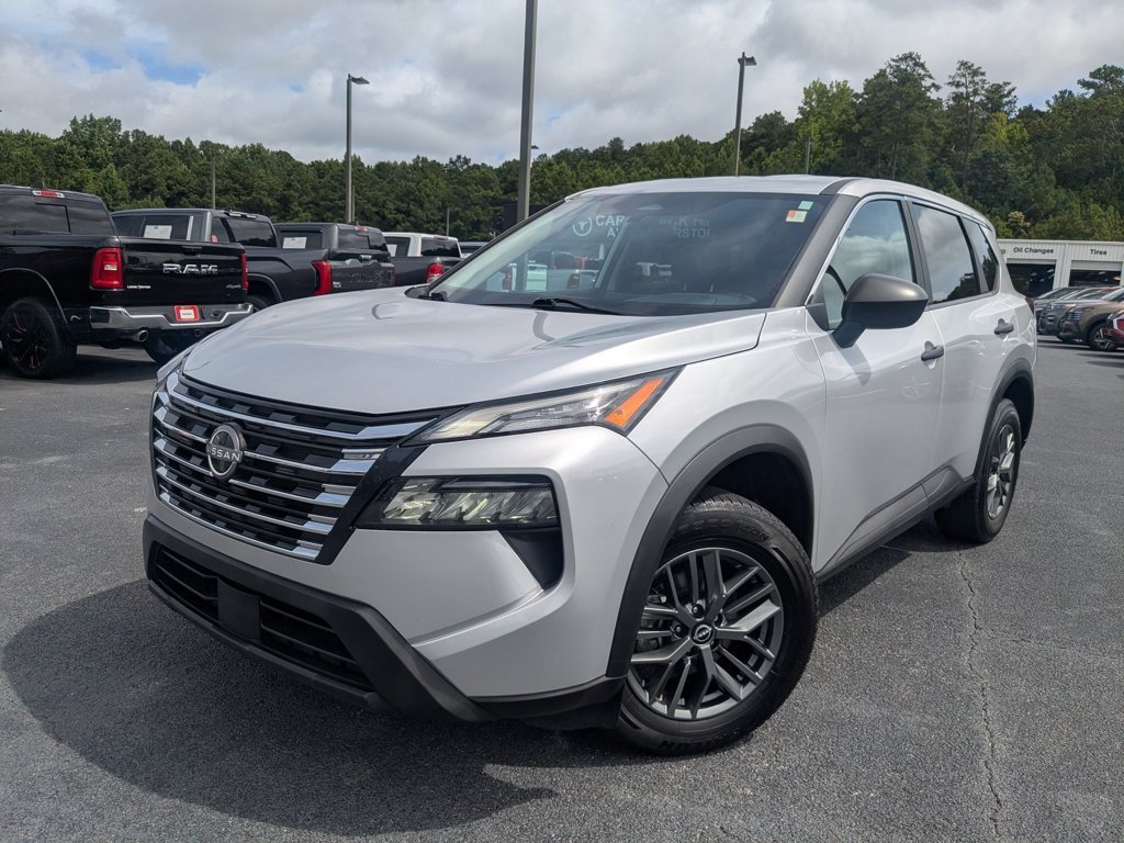 Used 2024 Brilliant Silver Metallic Nissan S image 1