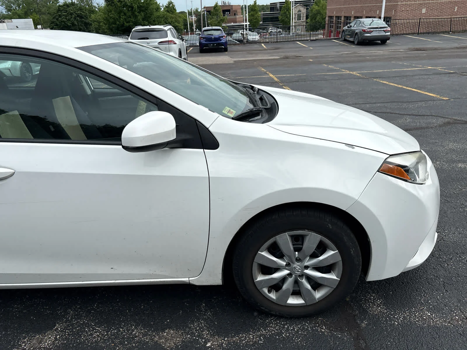 Used 2015 Super White Toyota LE image 15