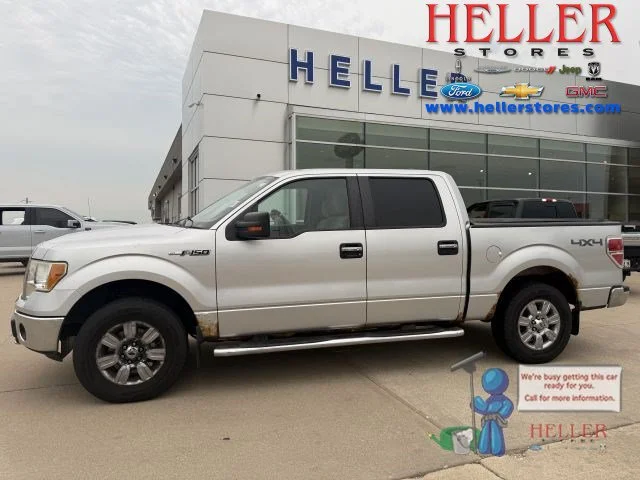 Used 2010 Ingot Silver Ford XLT image 1