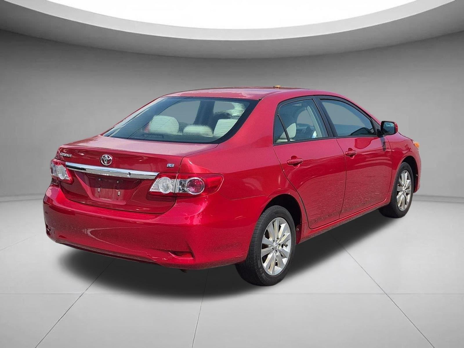 Used 2011 Barcelona Red Metallic Toyota LE image 5