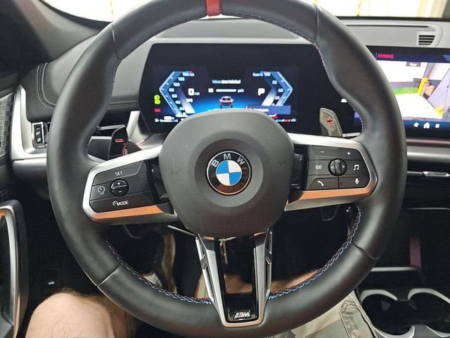 Used 2025 Black Sapphire Metallic BMW M35i image 3