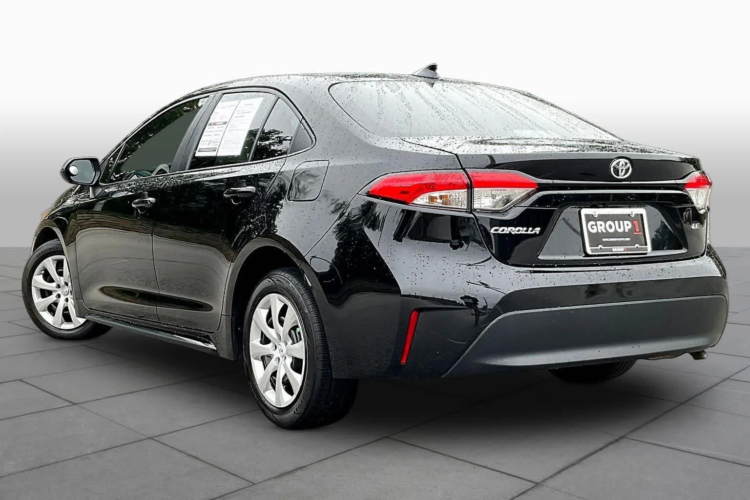 Used 2025 Midnight Black Metallic Toyota LE image 12