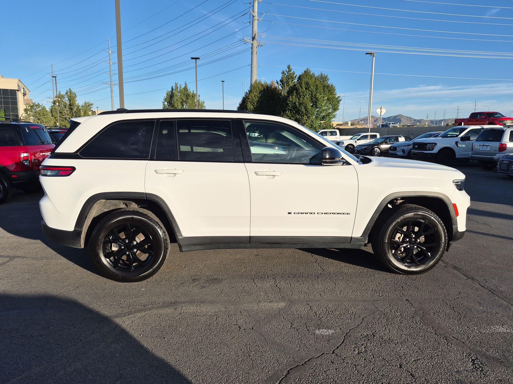 Used 2025 Bright White Clearcoat Jeep Altitude image 2
