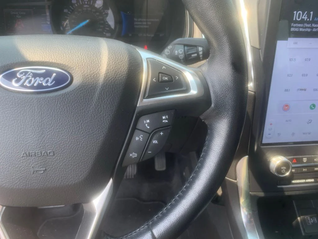 Used 2022 Silver Metallic Ford Titanium image 13