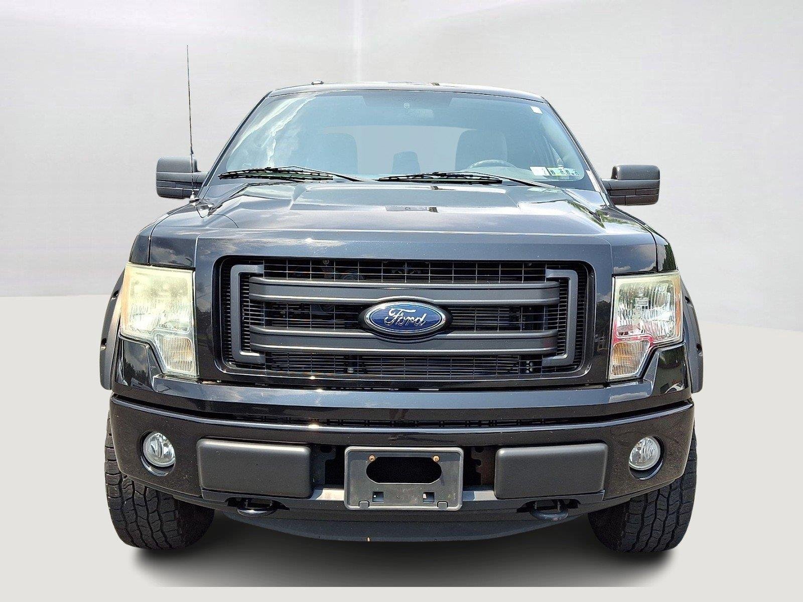 Used 2013 Tuxedo Black Metallic Ford STX image 2