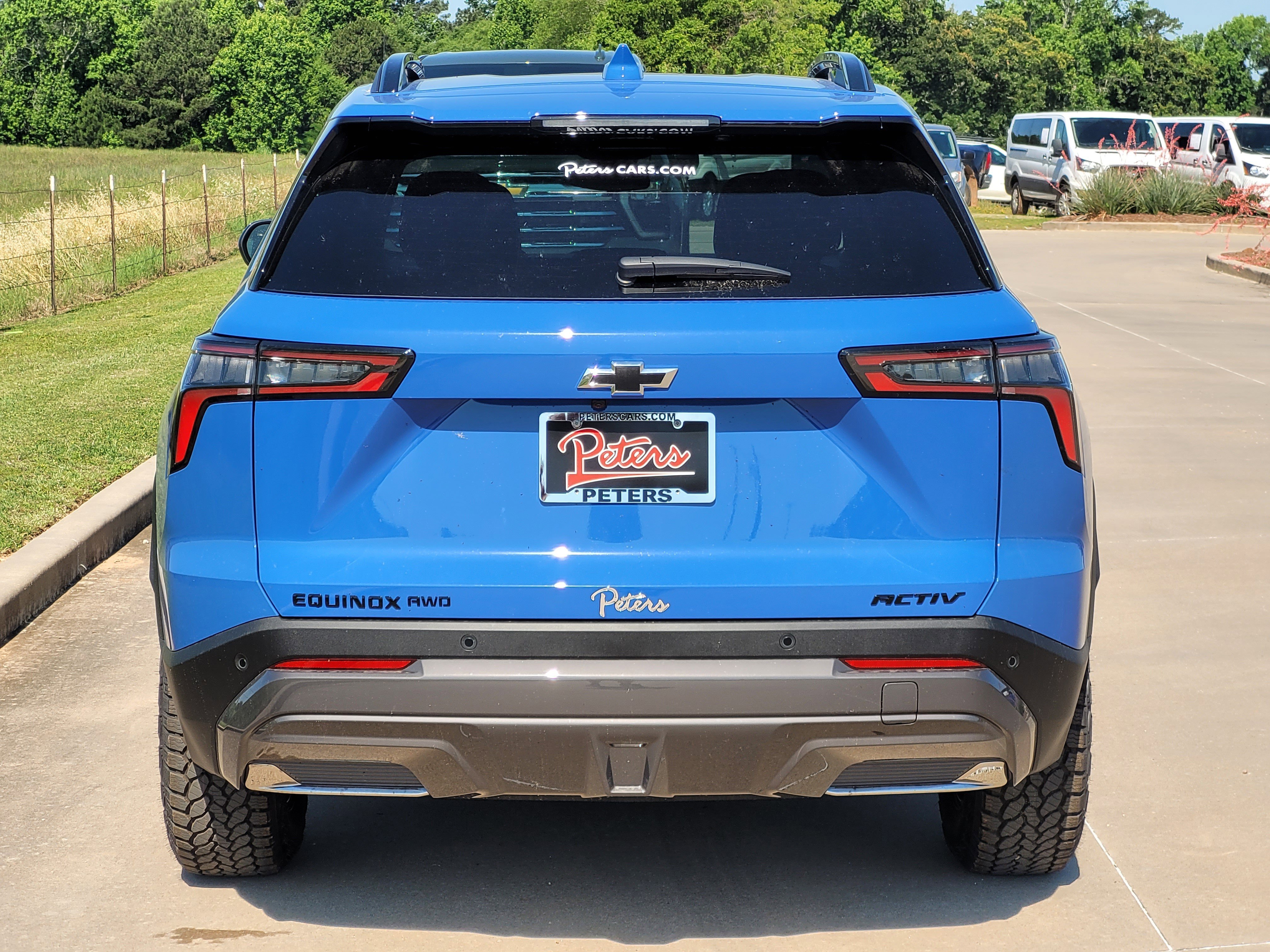 New 2026 Reef Blue Metallic Chevrolet AWD ACTIV image 4