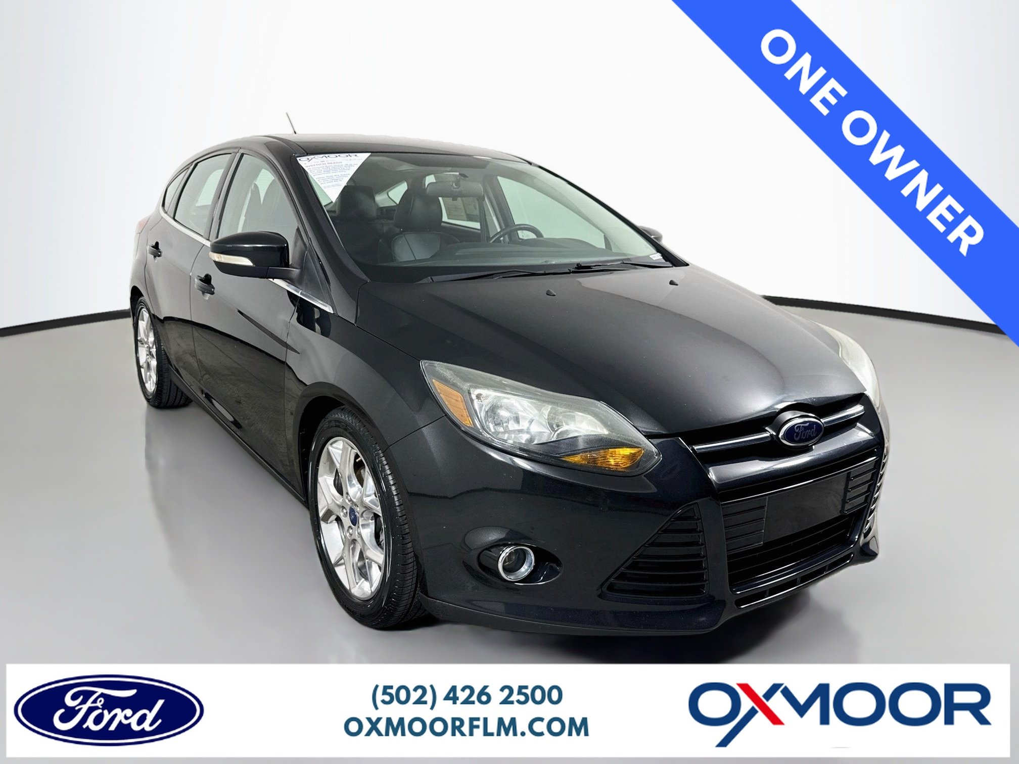 Used 2014 Tuxedo Black Metallic Ford Titanium image 1