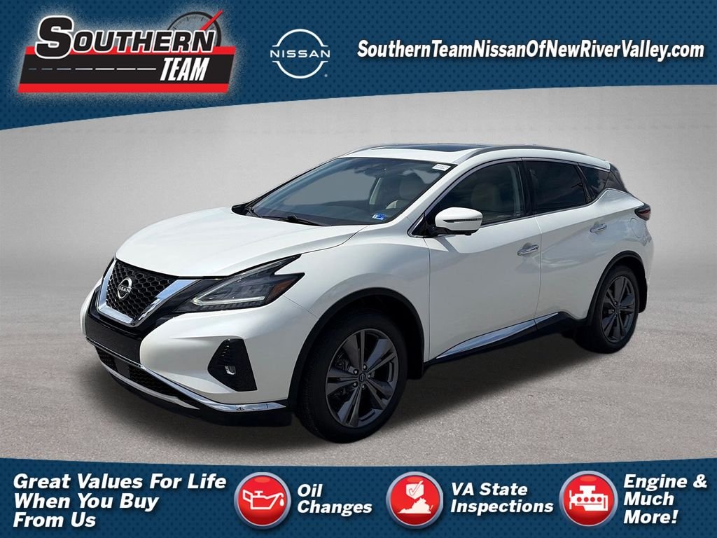 Used 2024 Pearl White Nissan Platinum image 1