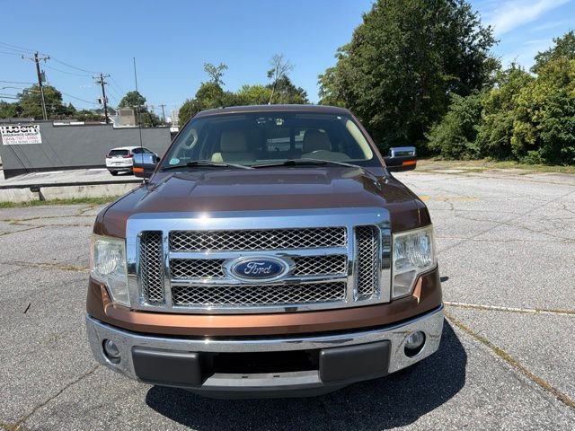 Used 2011 Bronze Metallic Ford Lariat image 1