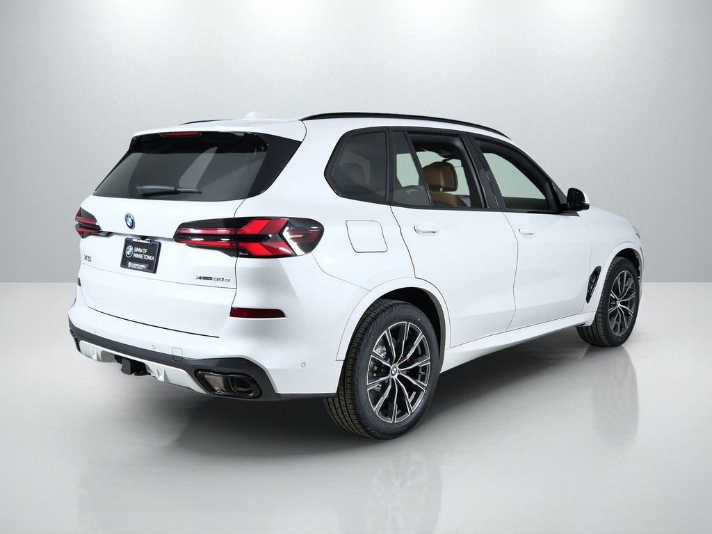 Used 2026 Mineral White Metallic BMW xDrive50e image 10