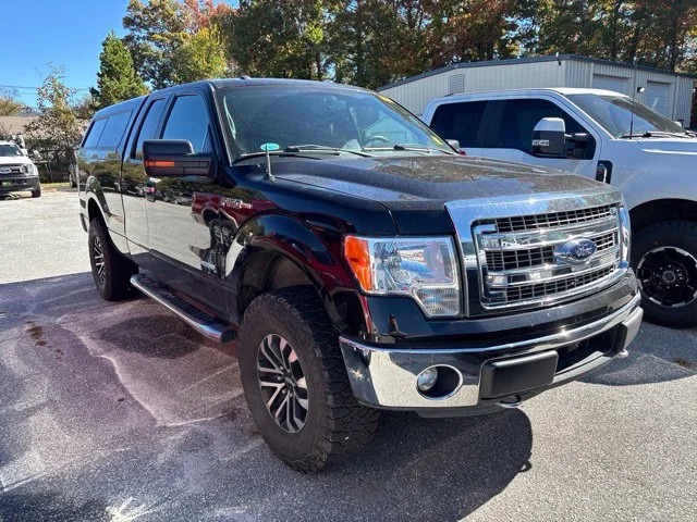 Used 2014 Tuxedo Black Metallic Ford XLT image 2