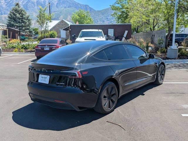 Used 2025 Solid Black Tesla Long Range image 3