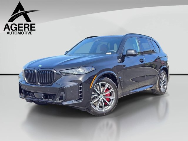 New 2026 Black Sapphire Metallic BMW xDrive50e image 1