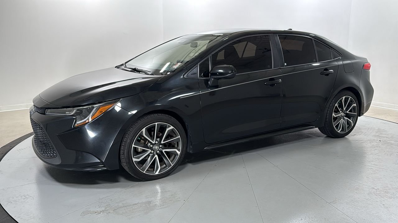 Used 2020 Black Toyota LE image 1