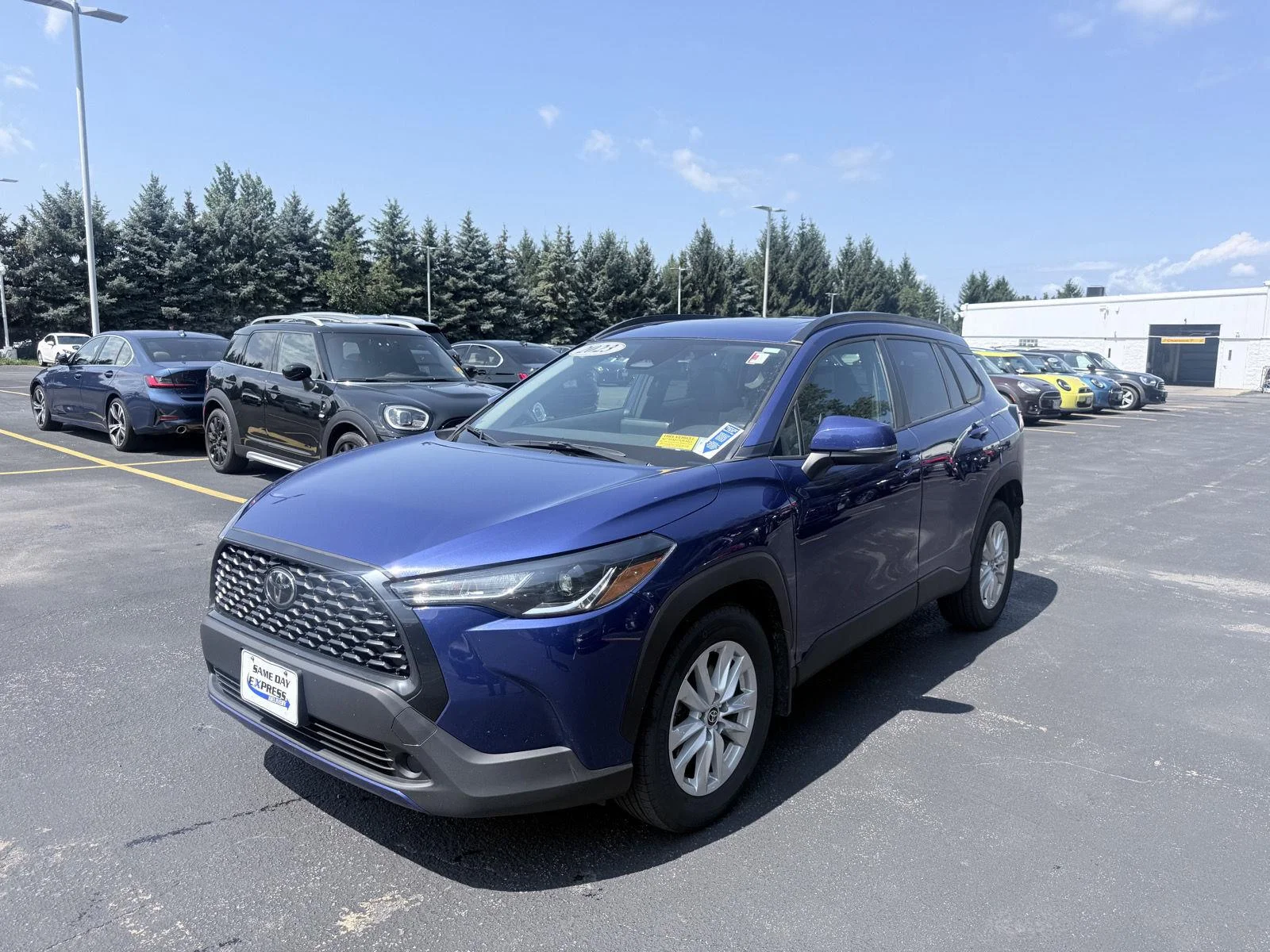 Used 2023 Blue Crush Metallic Toyota LE image 3