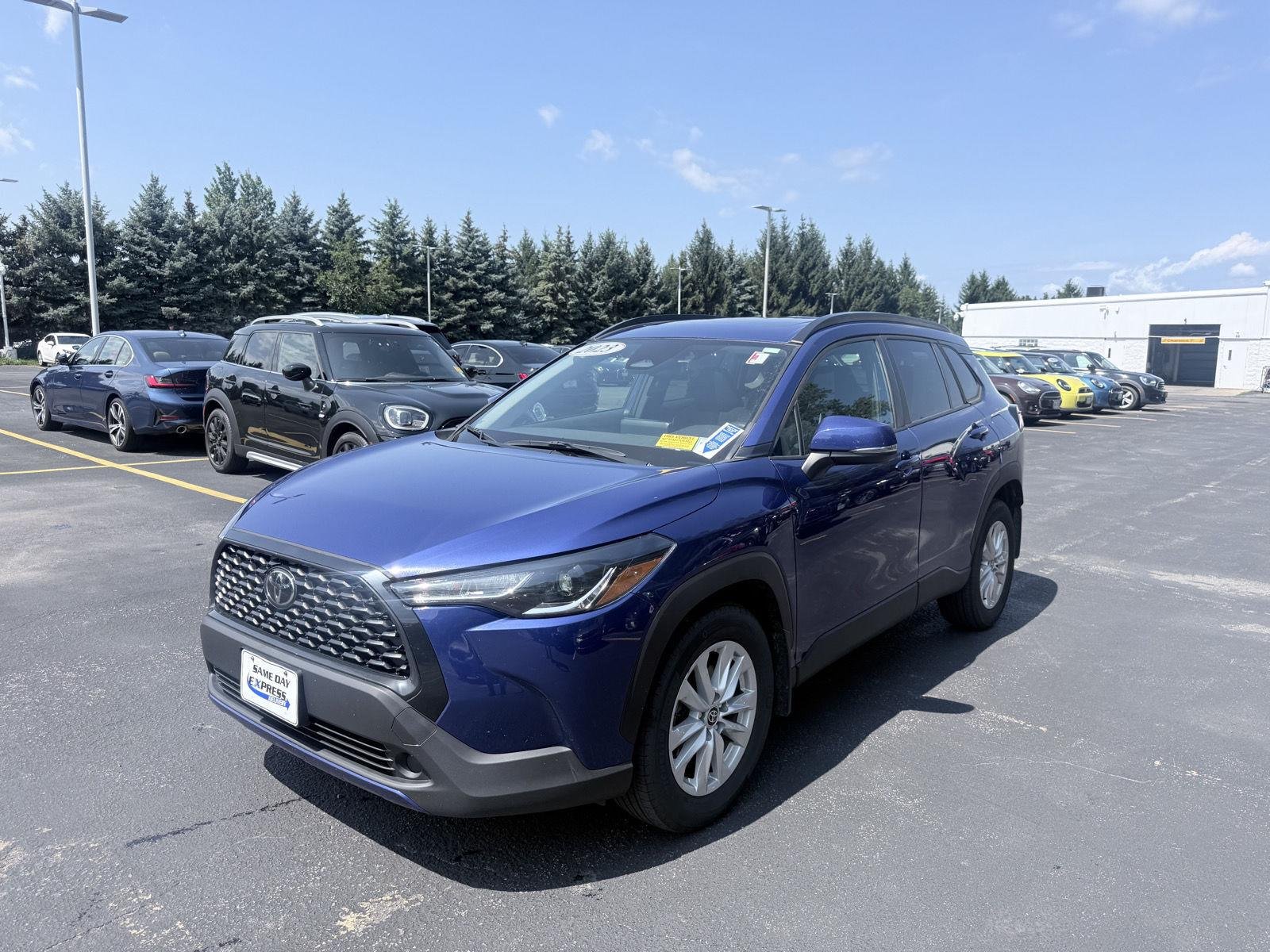 Used 2023 Blue Crush Metallic Toyota LE image 3