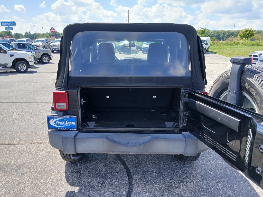 Used 2015 Black Clearcoat Jeep Sport image 11