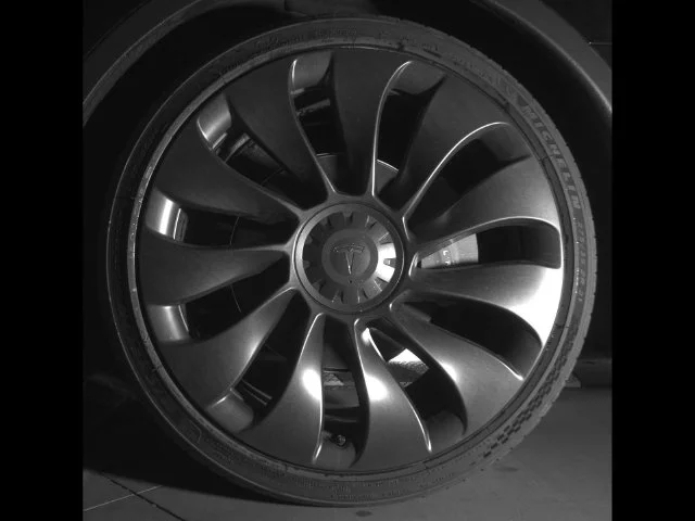 Used 2023 Solid Black Tesla Performance image 22