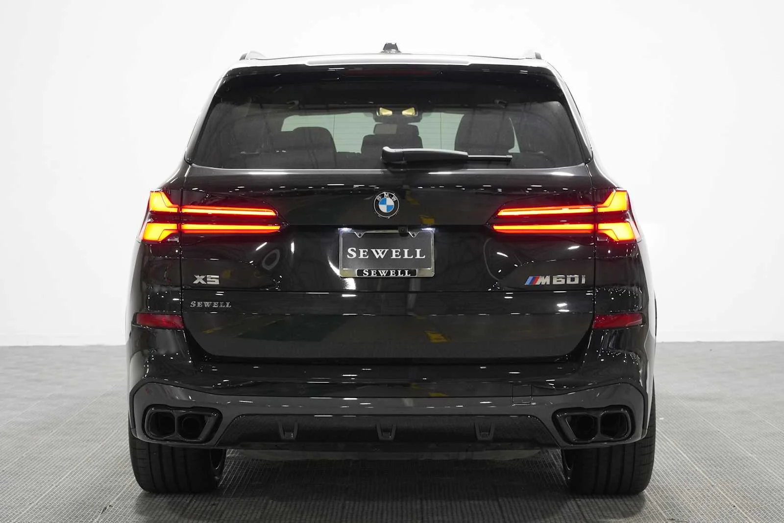 Used 2026 Black Sapphire Metallic BMW M60i image 8