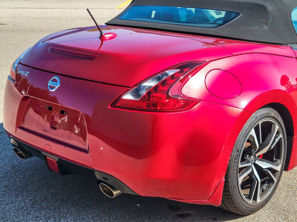 Used 2018 Passion Red Nissan Touring Sport image 8