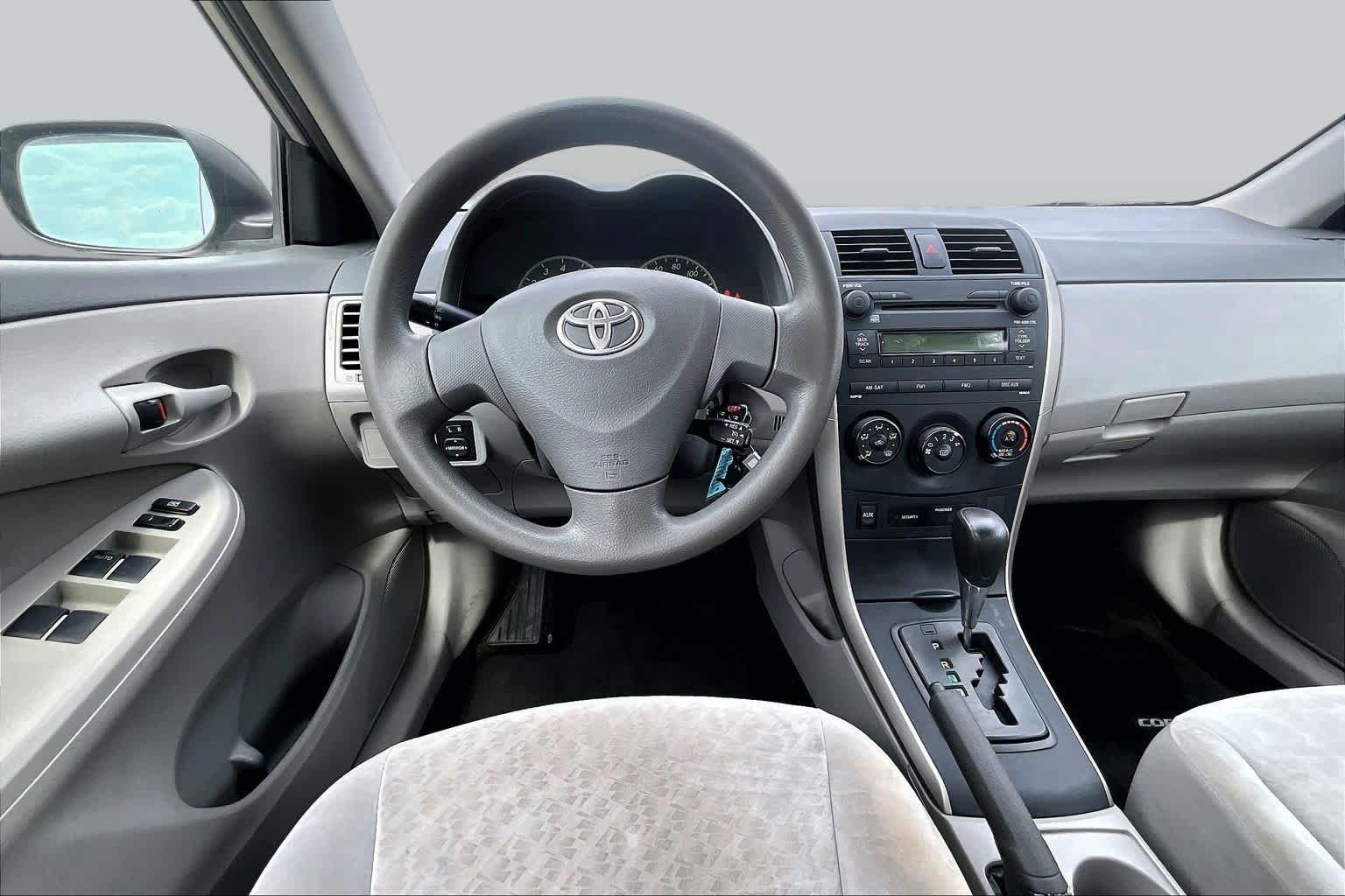 Used 2009 Classic Silver Metallic Toyota LE image 4