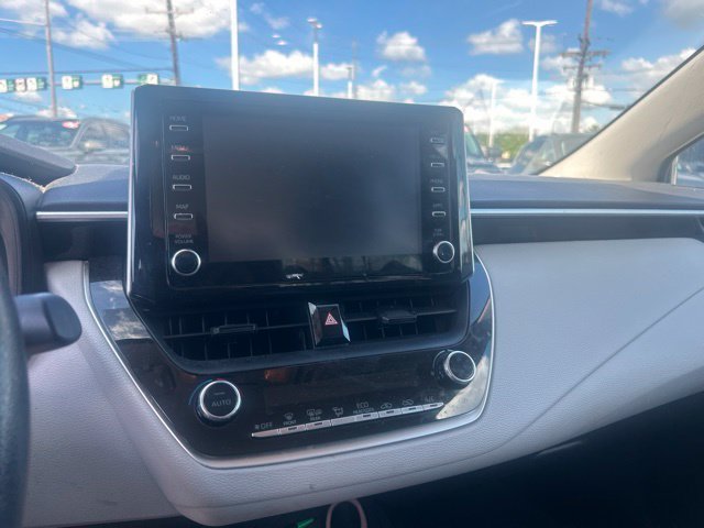 Used 2020 Super White Toyota LE image 4