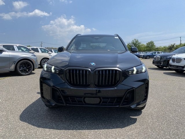 Certified Used 2026 Black Sapphire Metallic BMW xDrive40i image 2