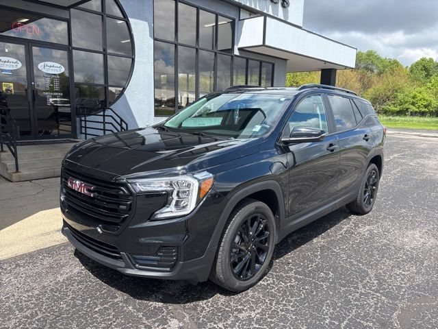 Used 2024 Ebony Twilight Metallic GMC SLE image 2