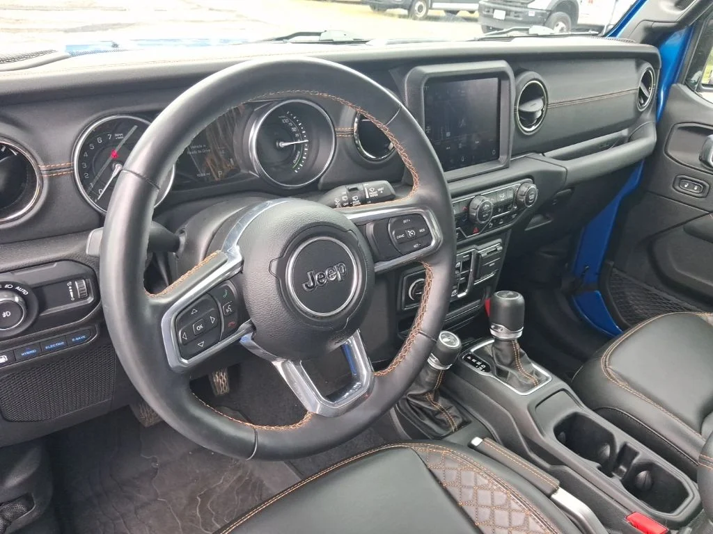 Used 2023 Hydro Blue Pearl Coat Jeep Sahara 4xe image 8