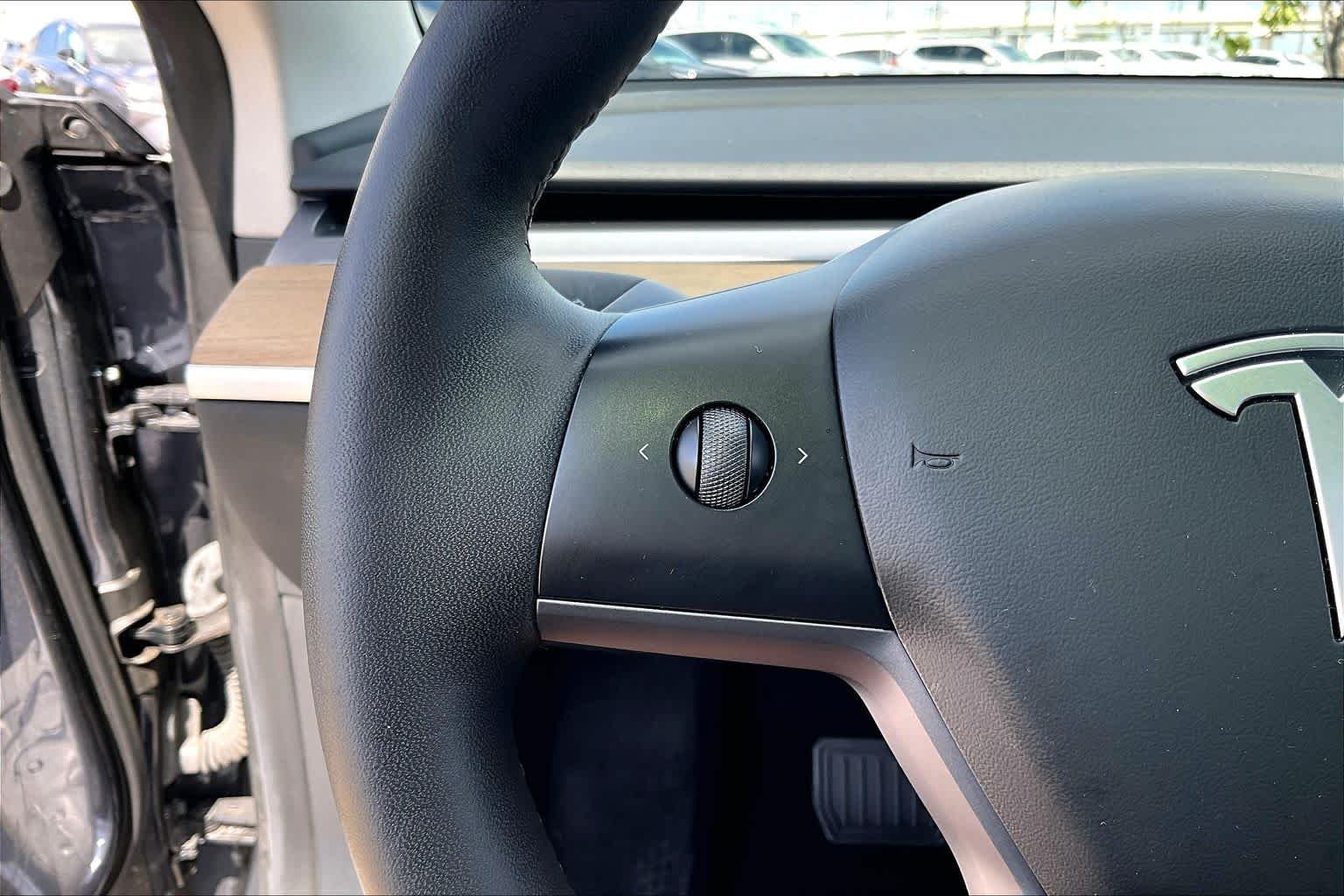 Used 2023 Solid Black Tesla  image 20