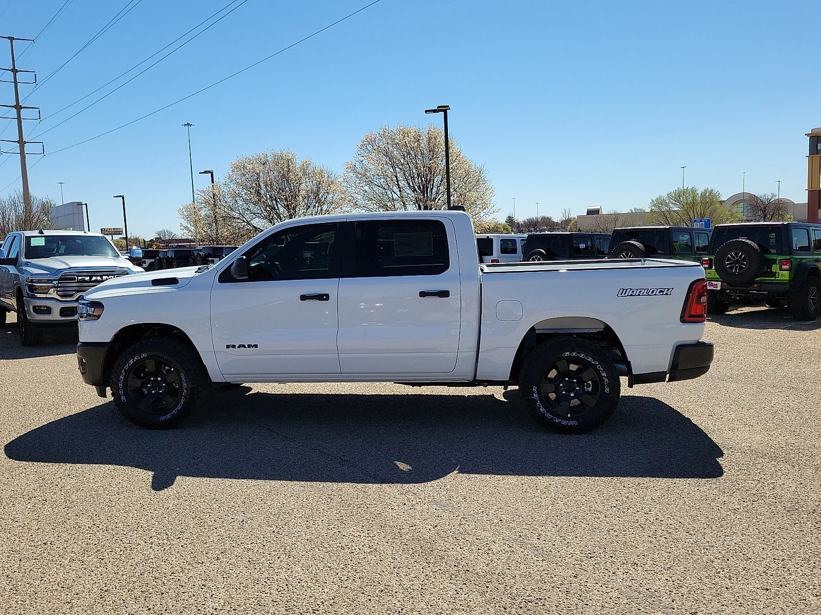 New 2026 PW7 Bright Whit Ram WARLOCK CREW CAB 4X4 5