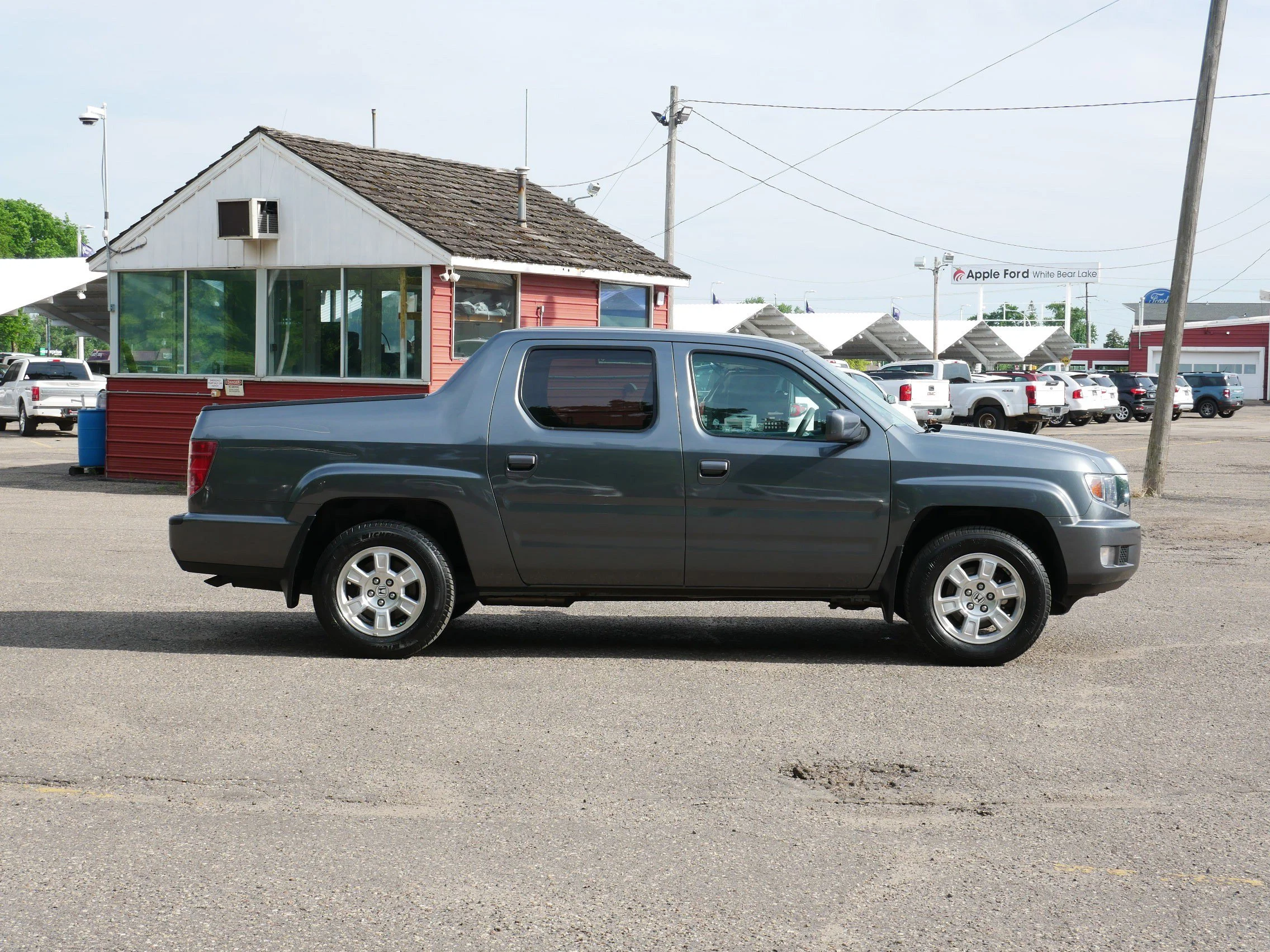 Used 2011 Honda Ridgeline RTS with VIN 5FPYK1F41BB008407 for sale in White Bear Lake, Minnesota