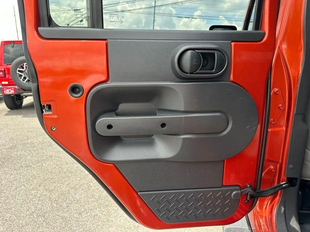 Used 2009 Orange Jeep Unlimited X image 16