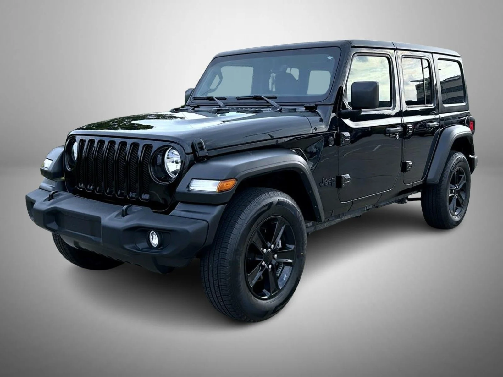 Used 2022 Black Jeep Unlimited Sport Altitude image 1