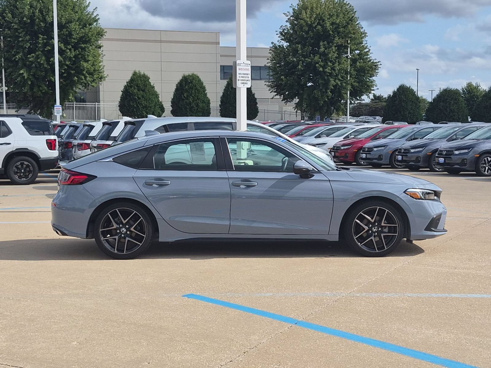 Certified Used 2024 Sonic Gray Pearl Honda Sport Touring Hatchback image 6
