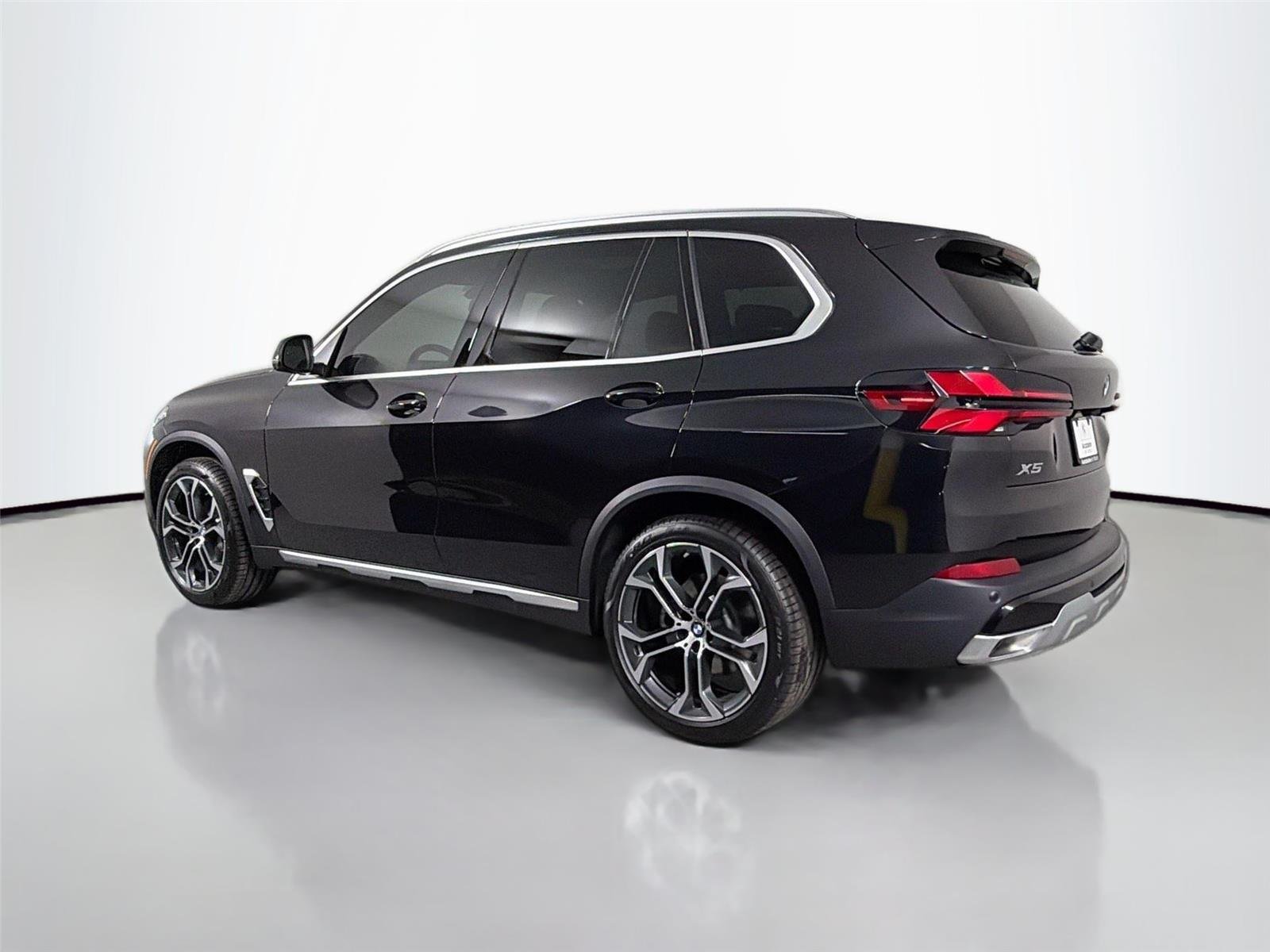 New 2026 Black Sapphire Metallic BMW sDrive40i image 14
