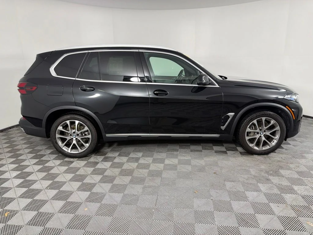 Certified Used 2025 Black Sapphire Metallic BMW xDrive40i image 4