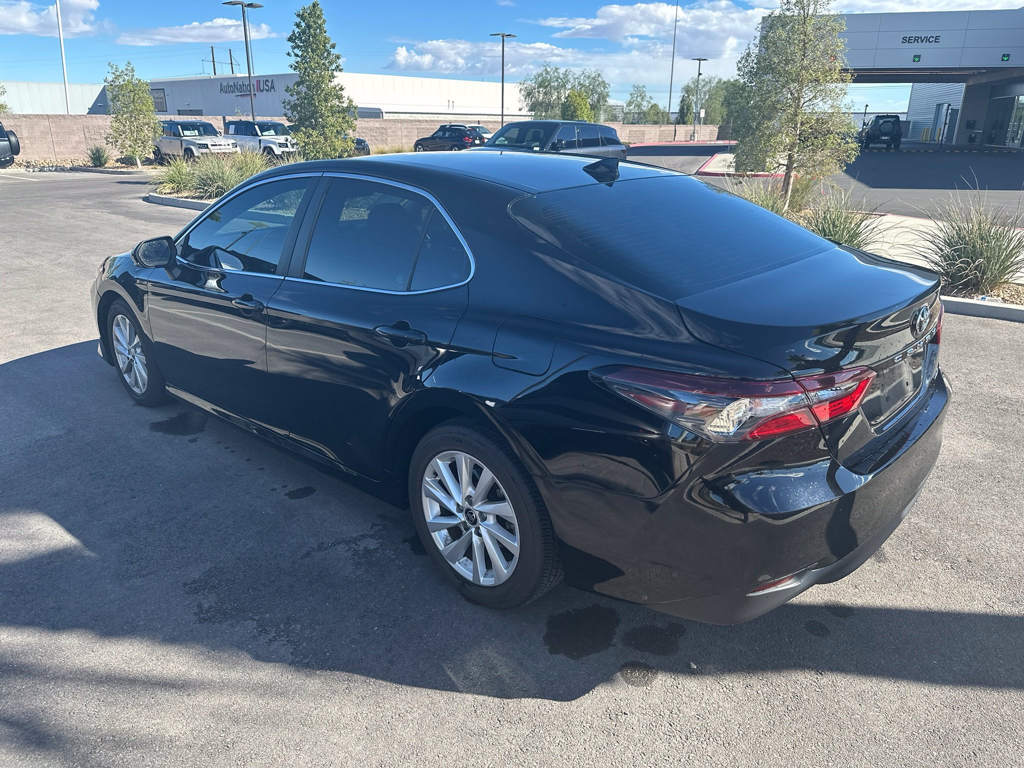 Used 2022 Midnight Black Metallic Toyota LE image 4