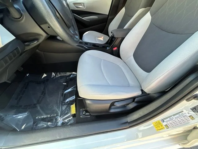 Used 2021 Super White Toyota LE image 21