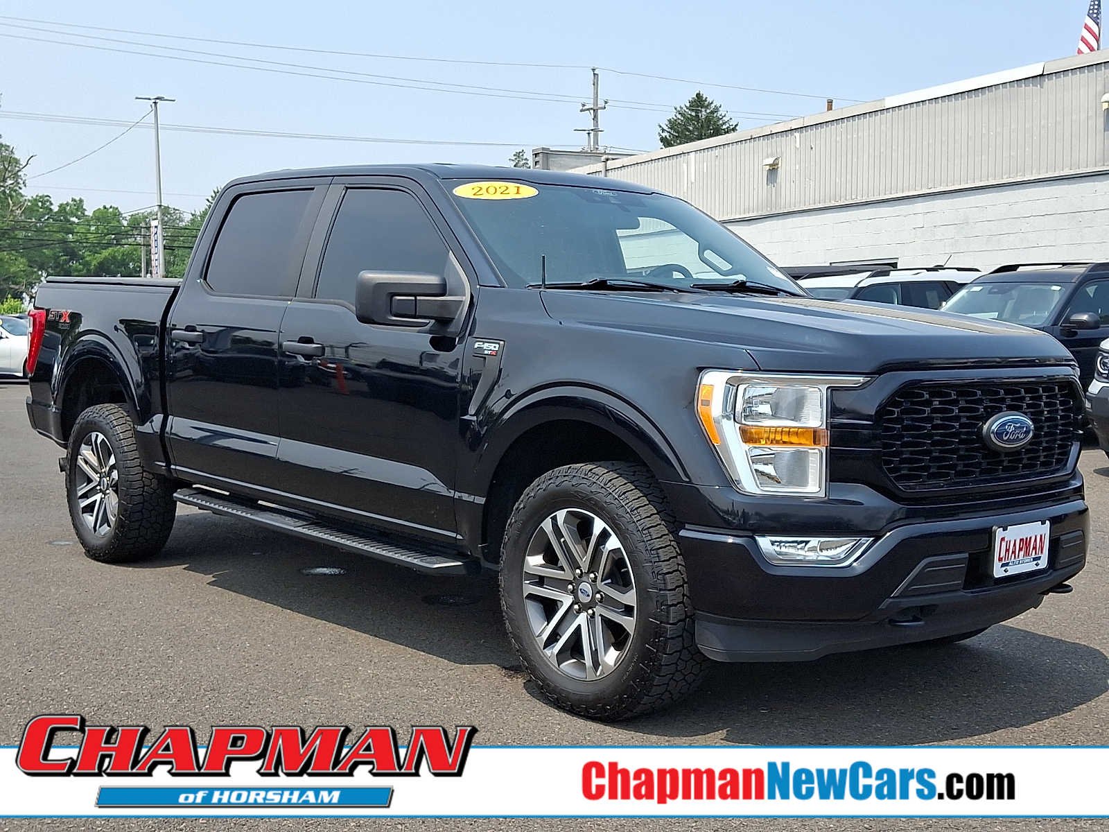 Used 2021 Agate Black Metallic Ford XL image 1