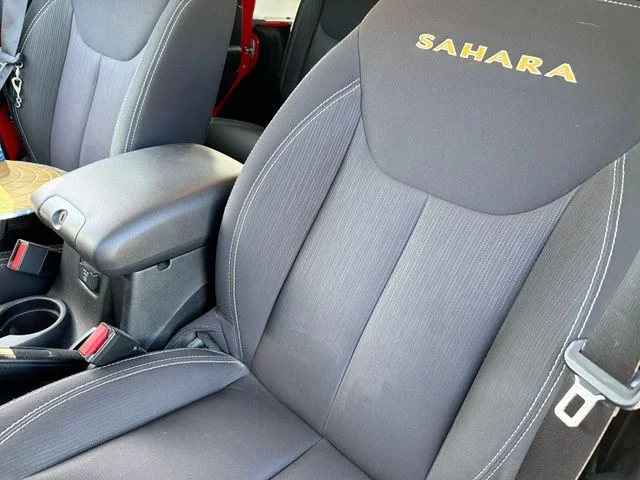 Used 2014 Red Jeep Unlimited Sahara image 14