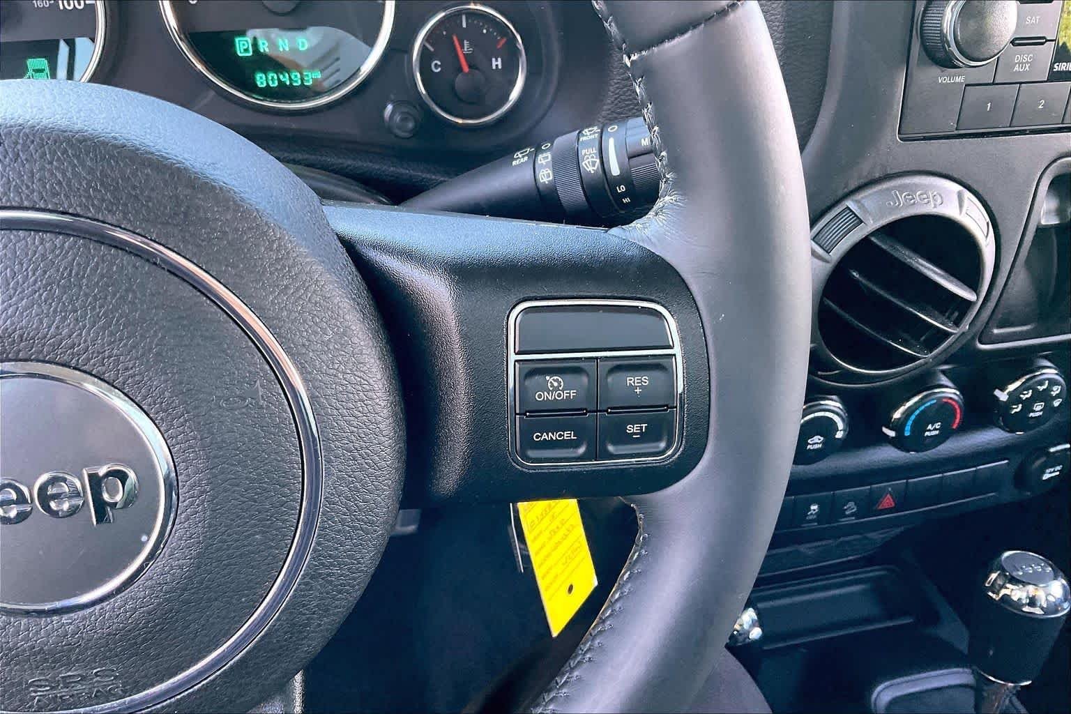 Used 2015 Baja Yellow Clearcoat Jeep Sport image 23