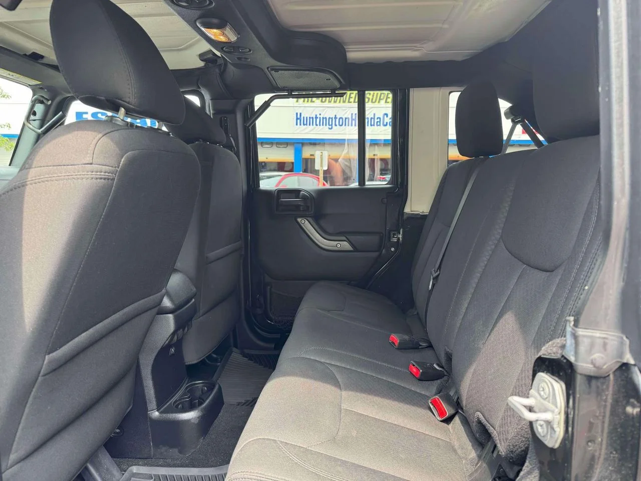 Used 2015 Black Clearcoat Jeep Sport image 17