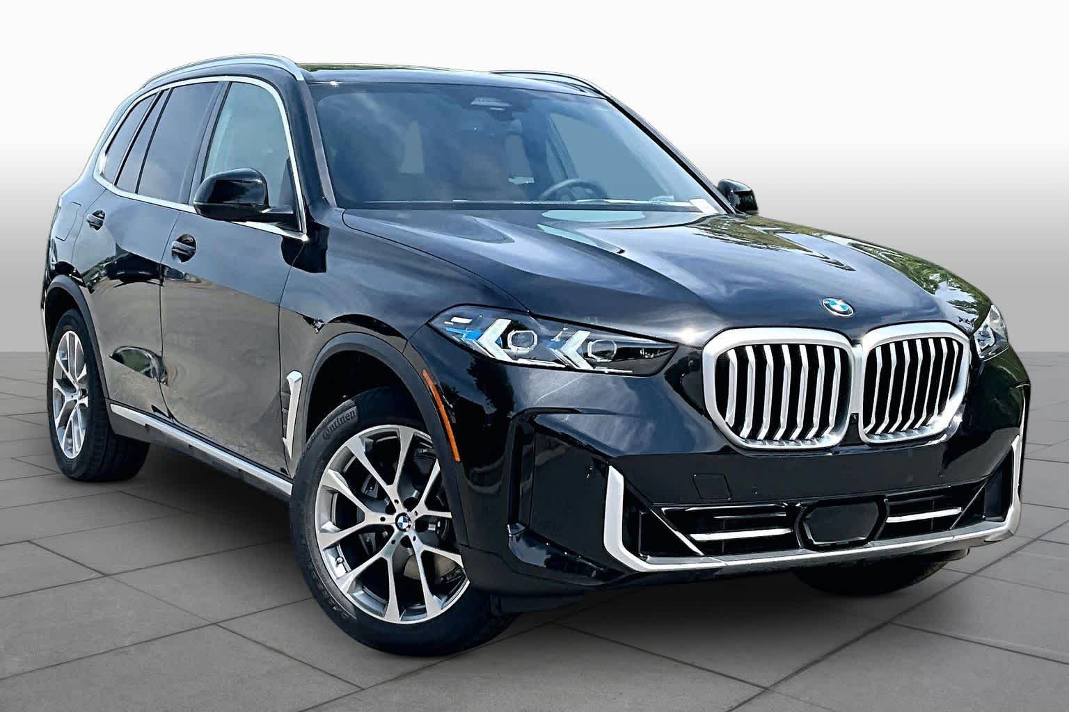 New 2026 Black Sapphire Metallic BMW sDrive40i image 2